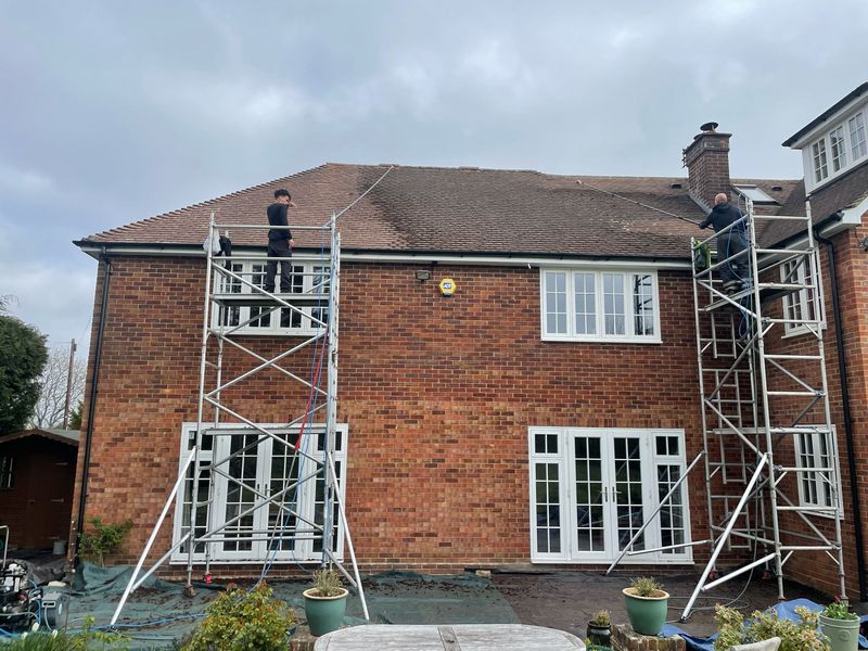 Roof cleaning carried out safely from scaffold towers by The Roof Moss Cleaners in Wendover